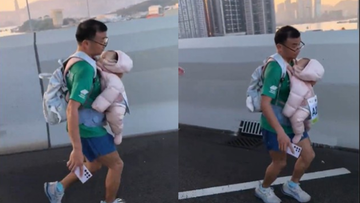 Descalifican a un atleta que corrió el maratón de Hong Kong... ¡porteando un bebé!