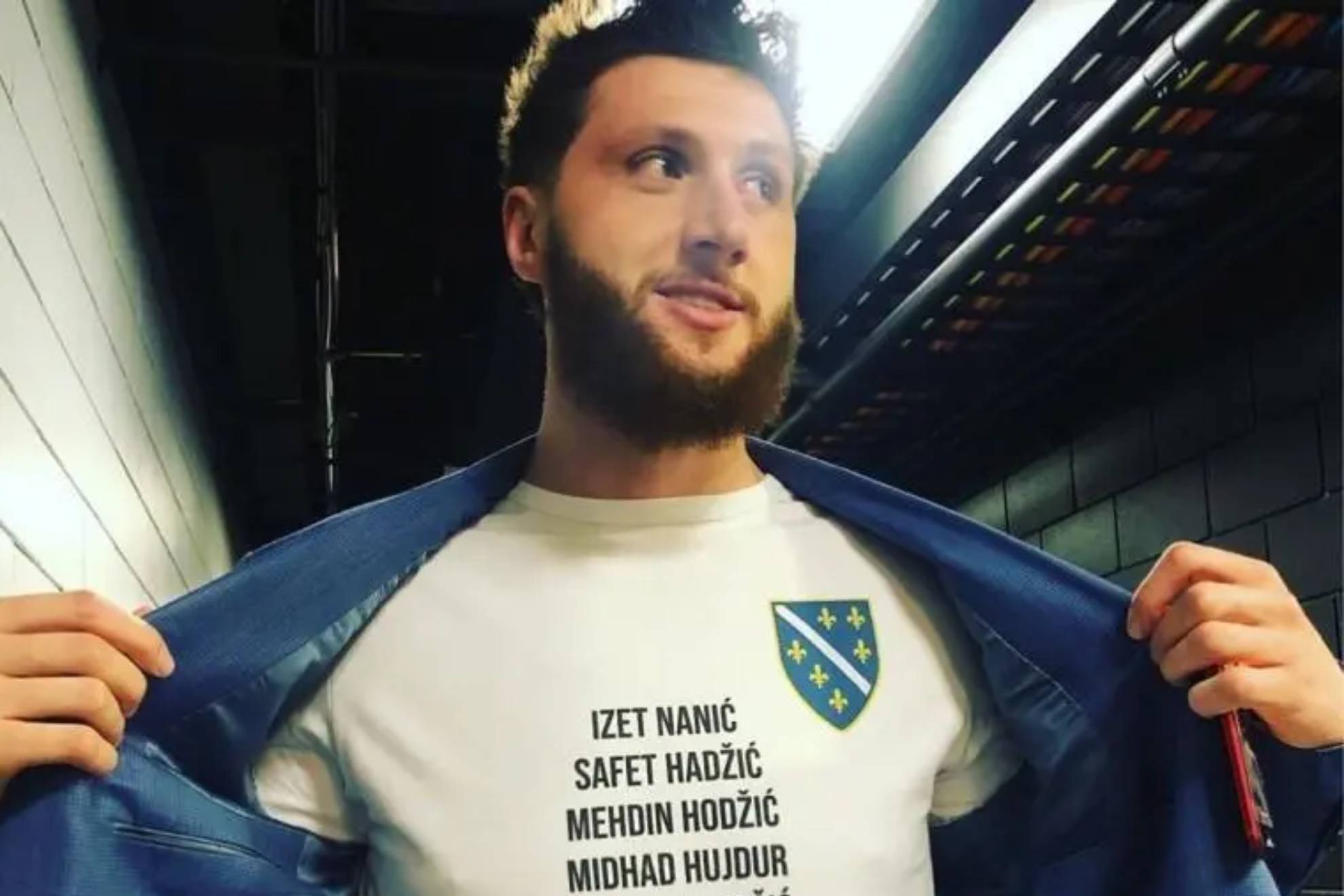Jusuf Nurkic looks a shirt with the names of Bosnian war heroes.