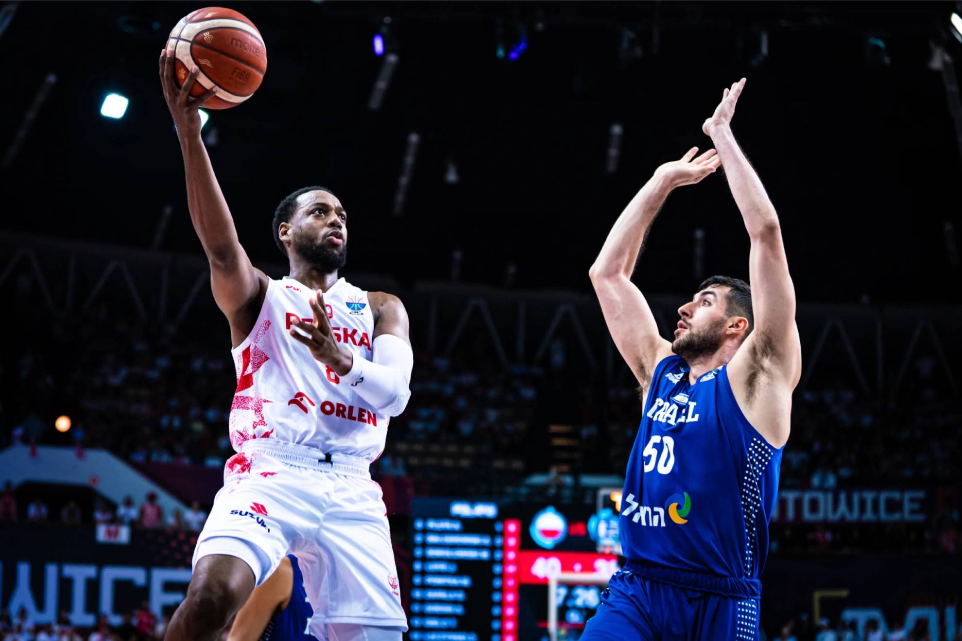 Jordan Loyd makes an entrance to the basket in the match against Israel.