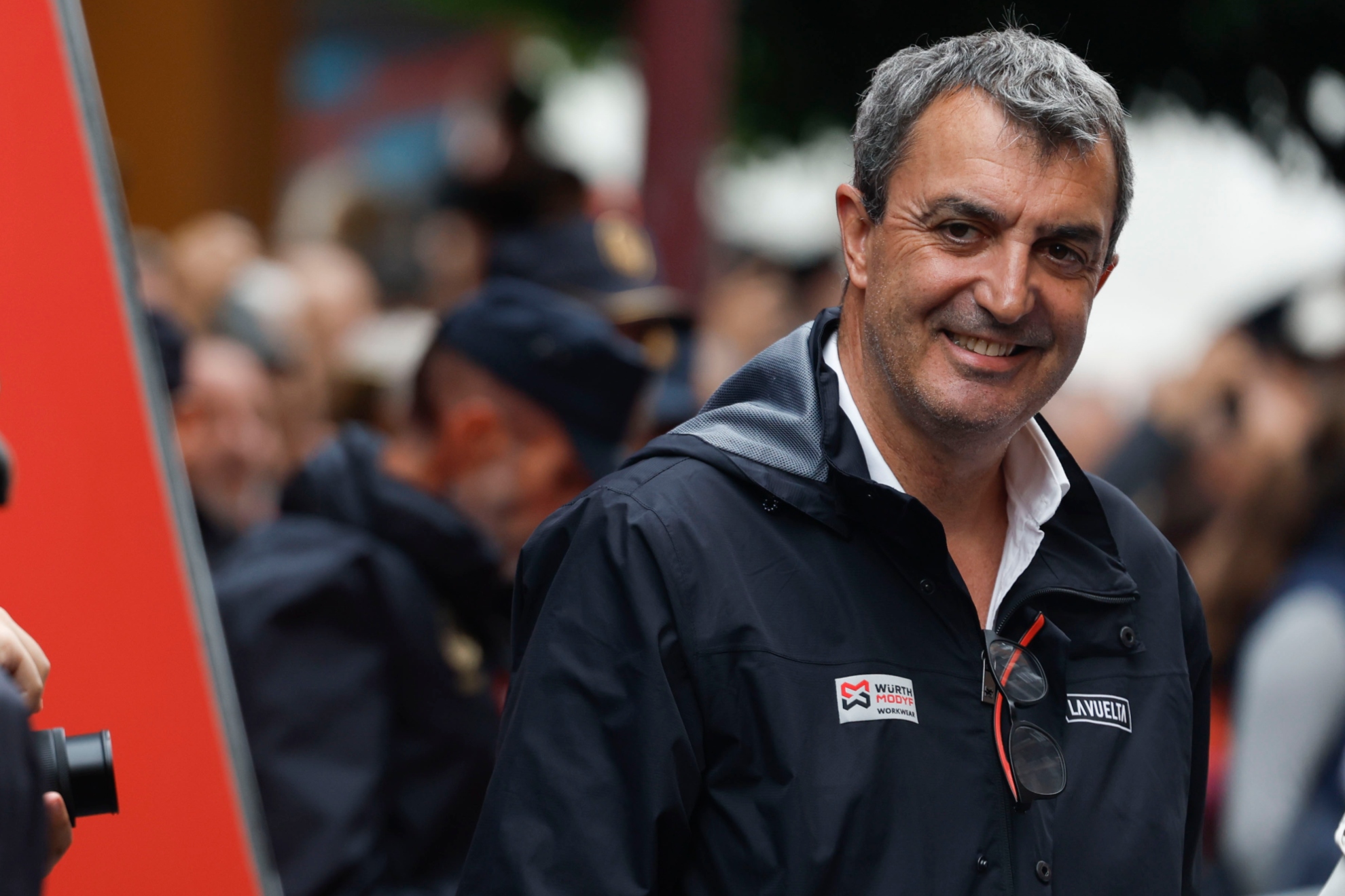 A professional motorcyclist leaning into a sharp turn