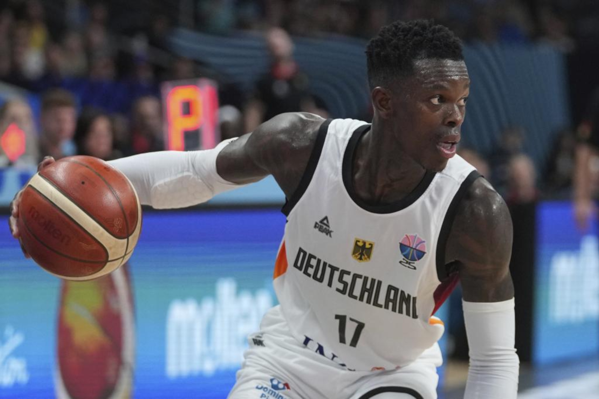 silhouetted figure contemplating cityscape