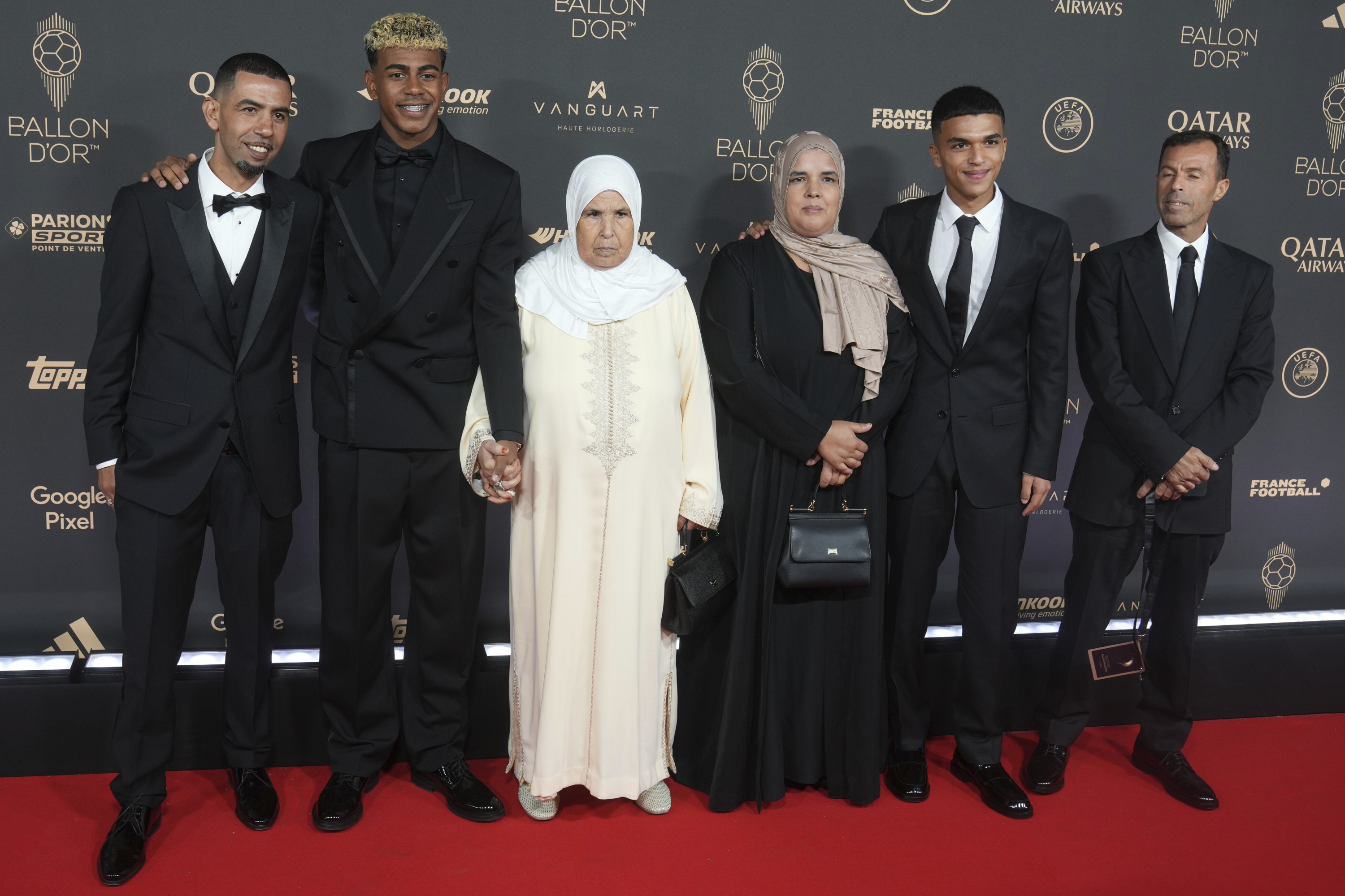 Lamine y su familia.