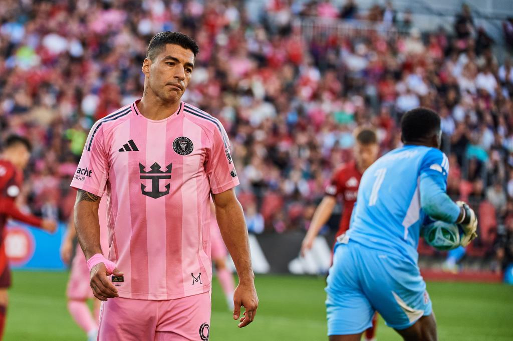 Inter Miami's Luis Suarez (9) reacts after missing a scoring opportunity against Toronto FC during the second half of a MLS soccer game, Saturday, Sept. 27, 2025, in Toronto. (Sammy Kogan/The Canadian Press via AP)